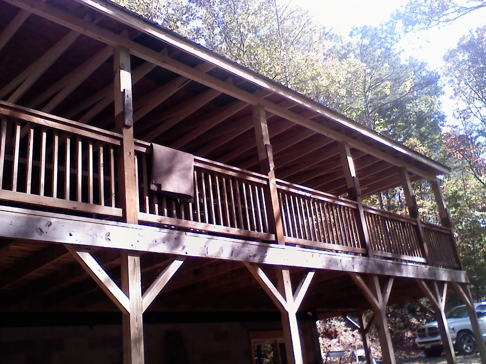 Timber framing under a new elevated porch and deck — Roof Leak Repair in Intervale by Roofing Brothers